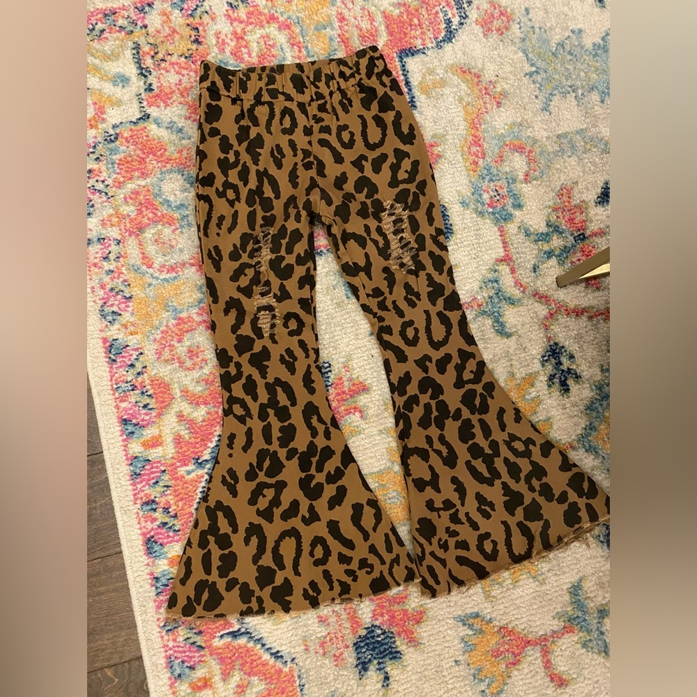 Leopard print flared pants - new with tags! Size 7